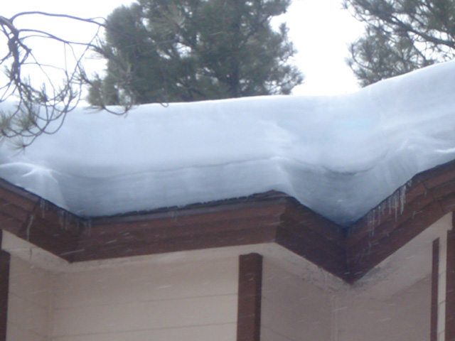 Ice dam in roof valley