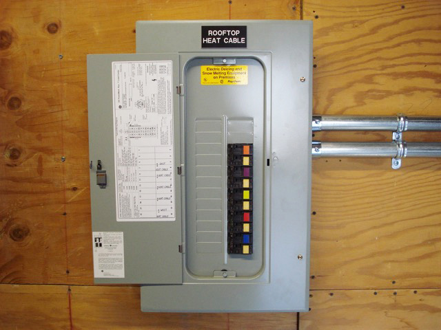 Remote electrical panel for controlling commercial rooftop heat tape operation