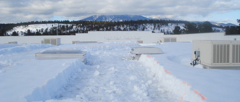 Flat roof snow removal